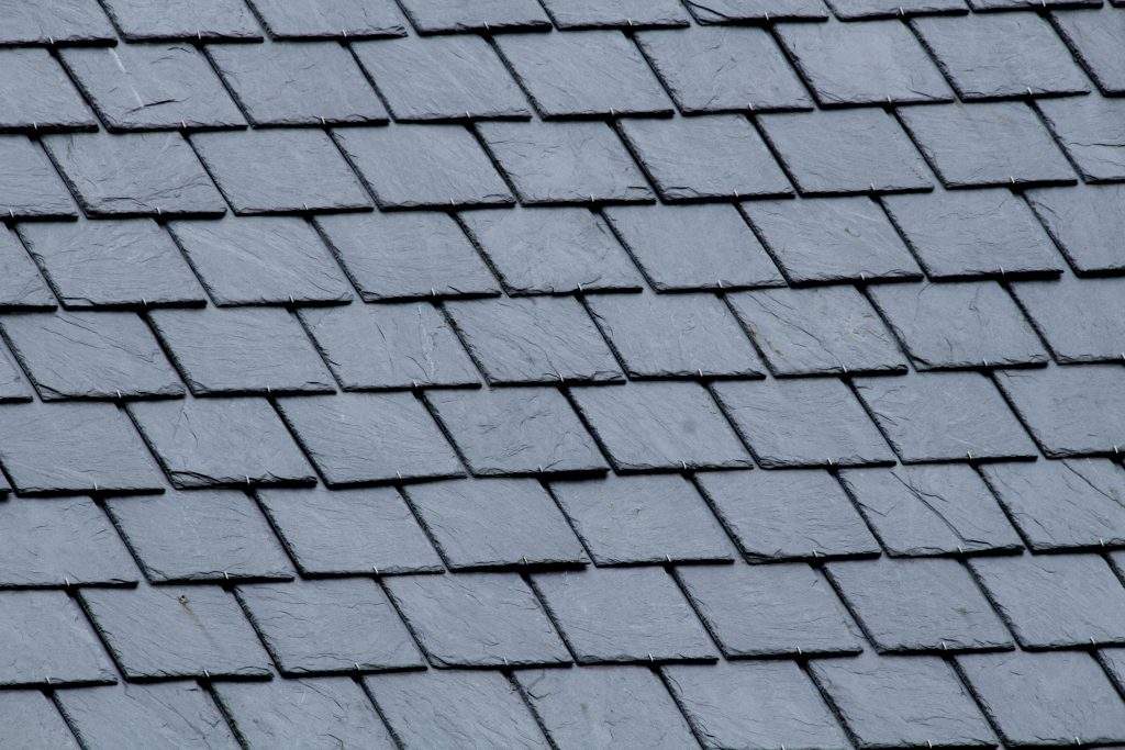 New slate roof, slate texture, perfect shape. Slating roof. Grey
