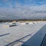 Construction of a flat roof with EPDM (ethylene propylene diene monomer) membrane on a large warehouse