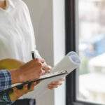 Builder inspection consultancy. Inspector checking material and structure in construction.